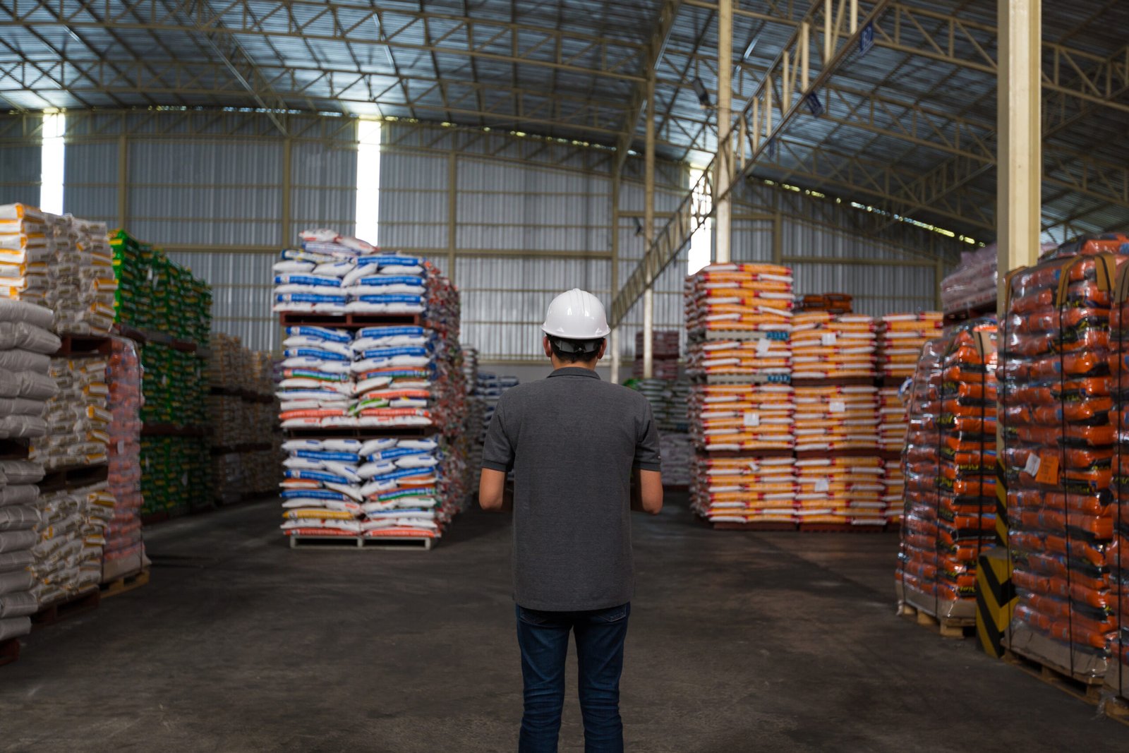 man is checking product quality warehouse warehousing quality control